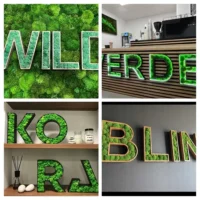 Houten letters met mos